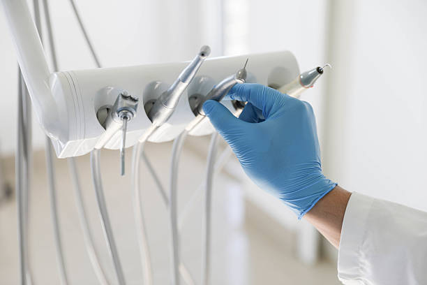 Professional Tooth Extraction technician working in Grand Forks AFB, ND